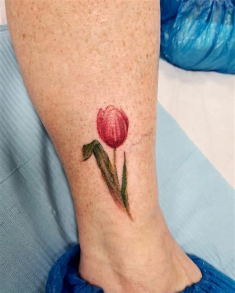 101 Amazing Tulip Tattoo Designs You Need To See 101 Amazing Tulip Tattoo Designs You Need To See