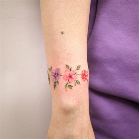 17 Unique Flower Bracelet Tattoo Ideas That Are So Daring I Take You Haircuts Hairstyles Hair Colours Home Decor To Wedding Ideas
