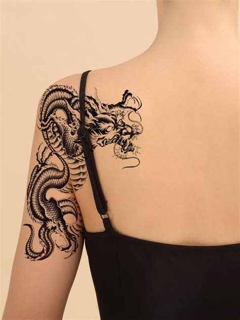 27 Dragon Shoulder Tattoo Stock Photos High Res Pictures And Images Getty Images