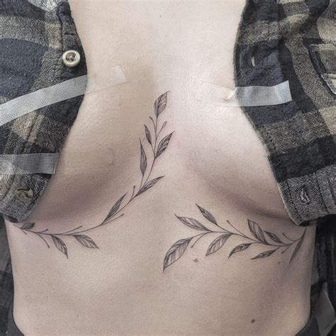30 Best Tattoo Between Breast Ideas You Should Check 30 Best Tattoo Between Breast Ideas You Should Check