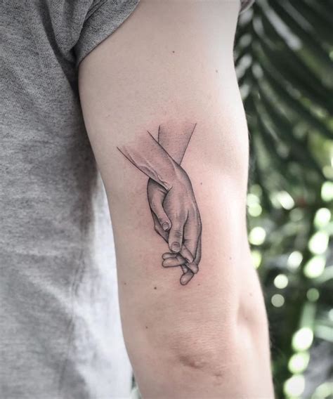 30 Great Holding Hands Tattoos You Will Love Hand Tattoos Tattoos Tattoo You 30 Great Holding Hands Tattoos You Will Love Hand Tattoos Tattoos Tattoo You