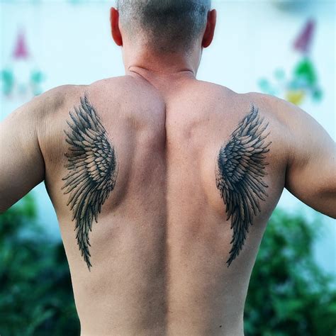 60 Angel Wings Back Tattoo Stock Photos Pictures Royalty Free Images Istock 60 Angel Wings Back Tattoo Stock Photos Pictures Royalty Free Images Istock