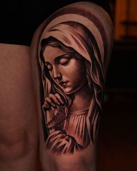92 Sensational Virgin Mary Tattoo Designs And Discover Their Meanings Tattoo Inspired Apparel