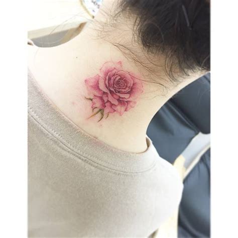 Back Of The Neck Tattoo Of A Watercolor Rose Back Of The Neck Tattoo Of A Watercolor Rose