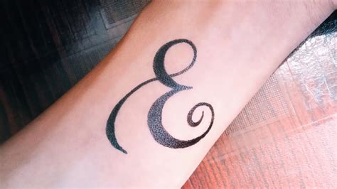 E Letter Tattoo Design