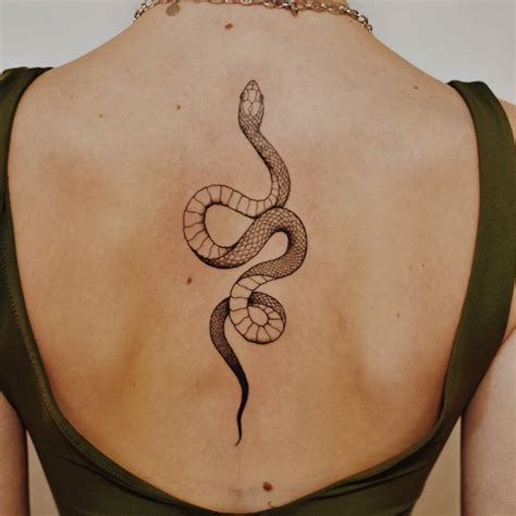 Fine Line Snake Tattoo On The Back Fine Line Snake Tattoo On The Back