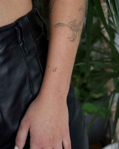 For The Free Spirit The Traveler And The Seeker Of Endless Horizons This Sun And Number 5 Tattoo Is All About Adventure And Transformation Number 5 In Numerology Symbolizes Change Freedom