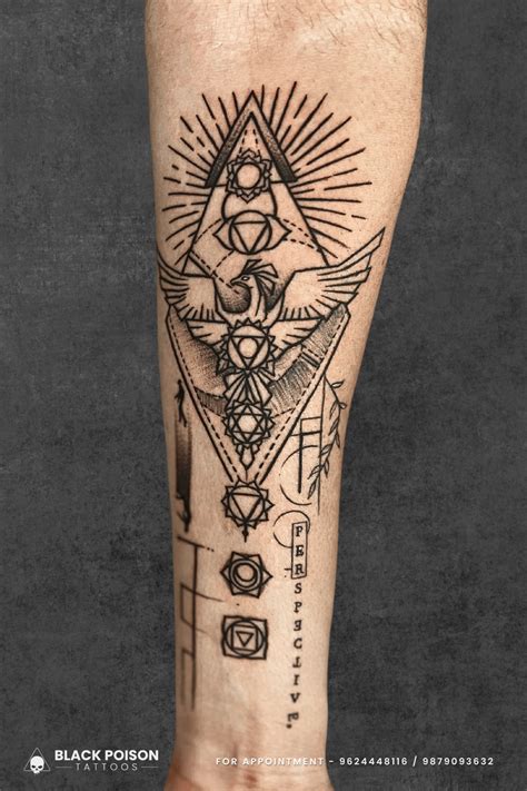 Forearm Tattoo With Phoenix And Chakra Symbols Forearm Tattoo With Phoenix And Chakra Symbols