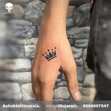 Hand Tattoo Crown And 5 By Leaf Done Hosa Tattoo Studio Ambassadortattoo Piercing Co Tattoo Art 5 Leaf Flashtattoo Tattooart Bodyart Tattoodesign Tattooideas