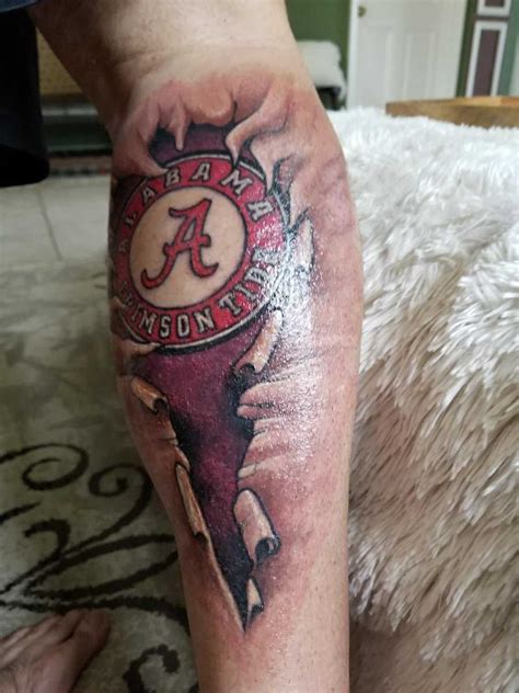 He Bleeds Crimson Alabama Fan Gets Crazy Calf Tattoo Photos He Bleeds Crimson Alabama Fan Gets Crazy Calf Tattoo Photos
