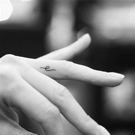 Minimalistic Style Letter Amp Quot E Amp Quot Tattoo Located On The