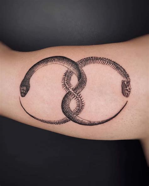 Ouroboros The Cycle Of Transformation This Powerful Ouroboros Tattoo Represents The Eternal Cycle Of Renewal Growth And Self Discovery The Serpent Eating Its Own Tail Is An Ancient Symbol Of Ouroboros The Cycle Of Transformation This Powerful Ouroboros Tattoo Represents The Eternal Cycle Of Renewal Growth And Self Discovery The Serpent Eating Its Own Tail Is An Ancient Symbol Of