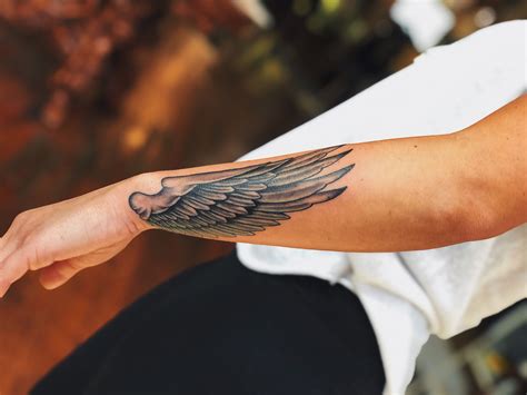 Pin By Darryl Roberts On Tattoos Wing Tattoo Wings Tattoo Hand Tattoos For Guys