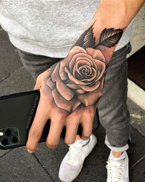 Pin By Neil On Tattoo Ideas Tattoos For Guys Rose Tattoos For Men Hand Tattoos For Guys