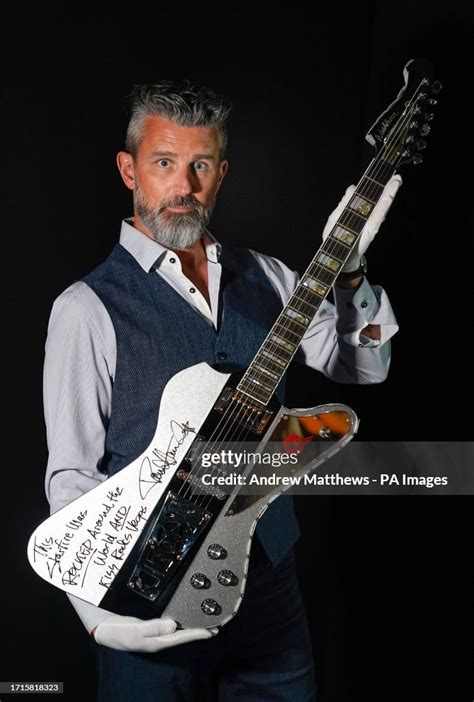 Propstore Ceo Stephen Lane Holds A Paul Stanley From Kiss Autographed News Photo Getty Images