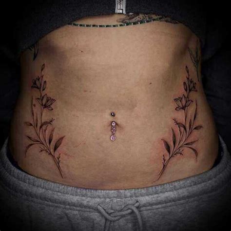 Sean Drennen Keunarene Stomach Tattoo From Last Week Craziest Belly Button Placement I Ve Done In A Long Time All Ke S Idea And She Sat Like A Instagram
