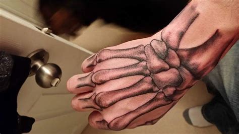 Skeleton Hand Tattoos Drawings Meaning Ideas Design Guide Neebol