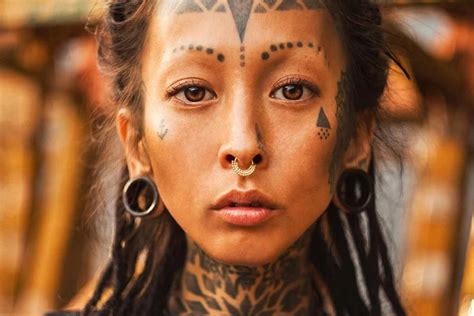 Tattoos Of Our Ancestors African Tribal Tattoos Piercings And Other Extreme Body Modification African Explorer Magazine