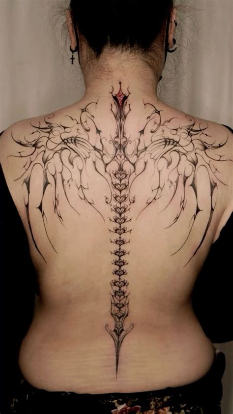 Top 10 Back Tattoo Ideas For Women Spine Wings Gothic Designs Servingsomelines