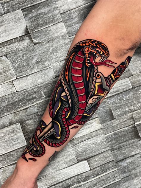 Traditional Snake With Dagger Done By Me R Traditionaltattoos Traditional Snake With Dagger Done By Me R Traditionaltattoos