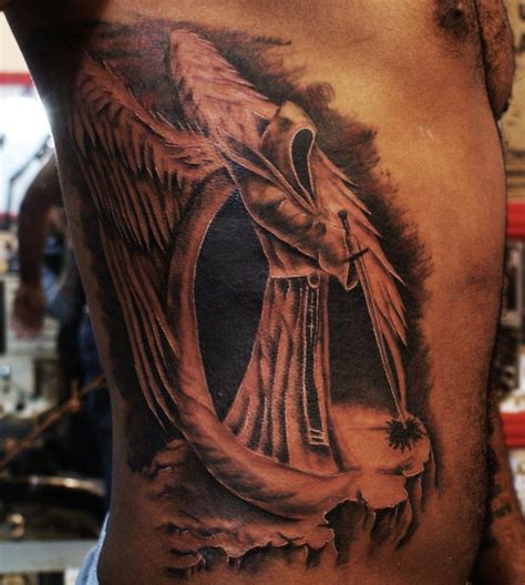 True 3D Death Angel Tattoo Design On Men Rib Side Truetattoos True 3D Death Angel Tattoo Design On Men Rib Side Truetattoos