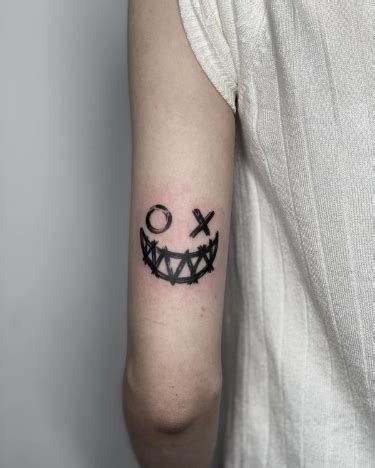 Unique Elbow Tattoo Distinctive Joker Smile Ink Above The Elbow Unique Elbow Tattoo Distinctive Joker Smile Ink Above The Elbow