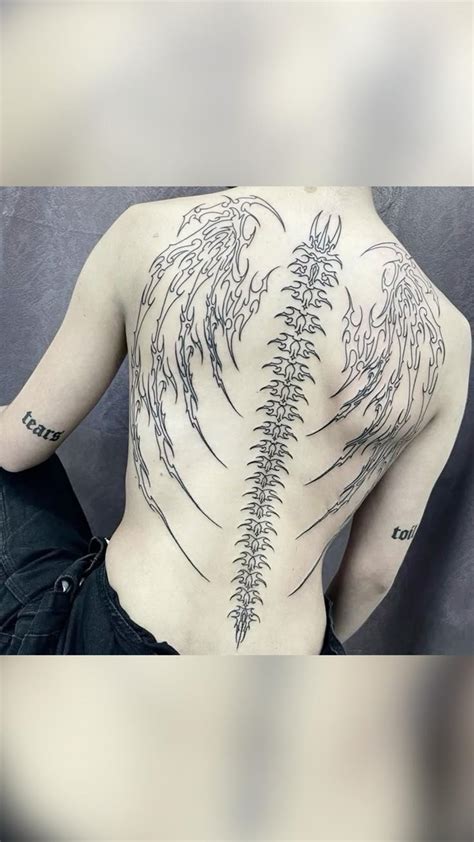 Upper Back Tattoos For Women Wings Swords Cyber Tribal Servingsomelines Upper Back Tattoos For Women Wings Swords Cyber Tribal Servingsomelines