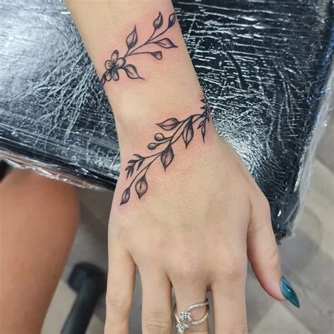 Vine Wrist Tattoo with Initials Design