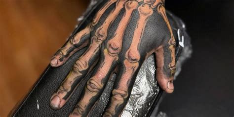 What S The Controversy Around Bone Hand Tattoos R Tattoodesigns What S The Controversy Around Bone Hand Tattoos R Tattoodesigns